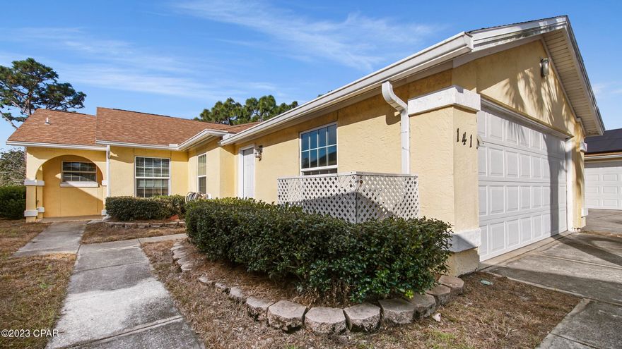 Charming 3 Bdrm/2 Bth home less than a mile to Public Beach Access #39 on the GULF! Located on a Cul-de-sac in the highly desired ''The Glades'' neighborhood. Minutes to all attractions, shopping and more, this home has the perfect location! Inside you will find a split floorplan with a tile entry way opening up to a spacious living room with a Cathedral Ceiling and LVP flooring; kitchen equipped with stone backsplash and tile flooring, granite countertops, pantry and a stainless steel fridge. The Master bdrm & en suite features new LVP flooring,  cathedral ceiling, his & hers closets, tile shower, Jacuzzi tub, and skylight. A large laundry room w/ sink, 2 car garage with built in cabinets. Screened in tiled back patio, over looking a fenced yard. Measurements approx; verify if important.