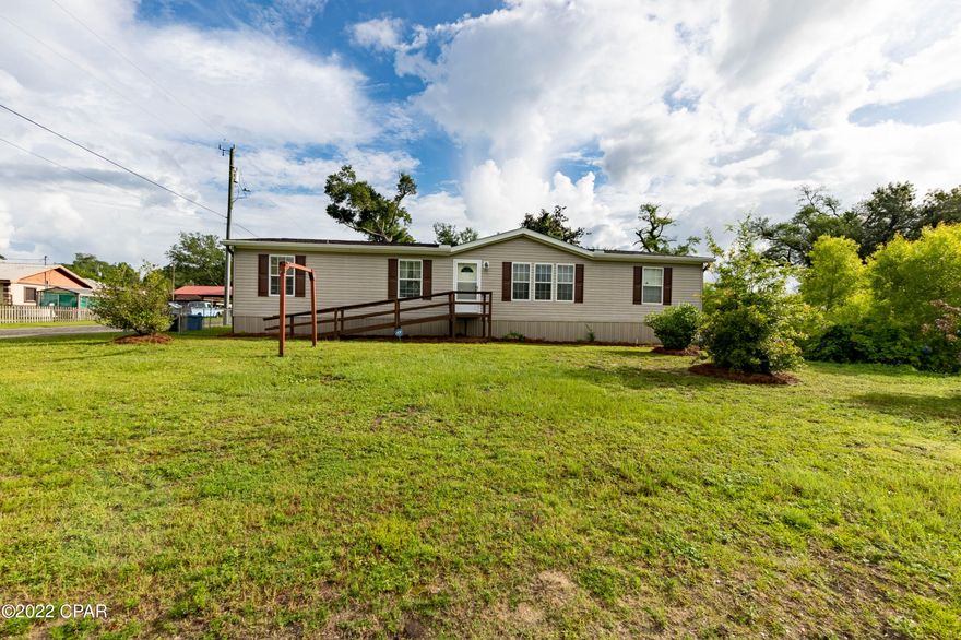 If you are having a hard time finding a MOVE IN READY home under 200k this could be the home for you!!! This home sits on more then 1/3 of and acre  CORNER LOT with fencing in the back along with a great pole barn for covered parking and an enclosed workshop with tons of shelving and storage! Conveniently located in Southport allows for  easy access to shopping, banking, and walking distance to Southport Elem. This home has a great layout/floor plan with the kitchen being the heart of the home next to the formal dinning area that leads to the large living room with a beautiful fireplace to enjoy!! The master bedroom and large master bath are on one side of the home and the other 2 bedrooms and bath are at the opposite end! This really is a great price for this property!//BUYER TO VERIFY ALL IMPORTANT INFO AND SIZES!!!!!