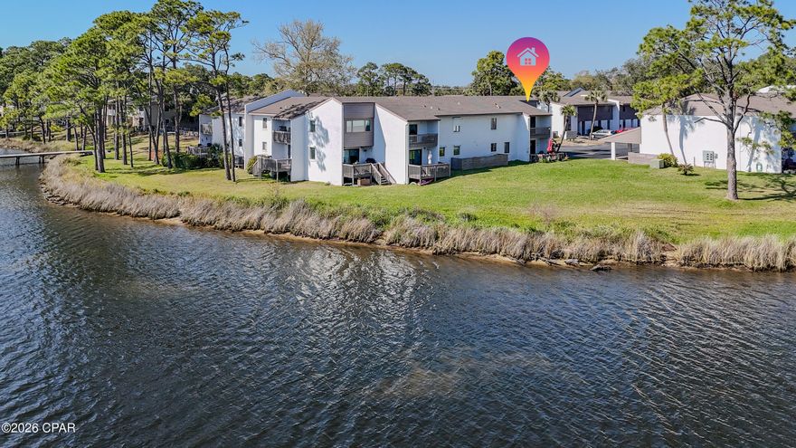 This updated 2-bedroom, 2.5-bath condo offers beautiful views of the lagoon and a comfortable, move-in-ready feel. Inside, you'll find fresh paint, updated cabinets and countertops, new appliances, and updated flooring throughout. The living and dining areas sit right off the kitchen, creating an open layout with great water views.
The main level includes the living space, a half bath, laundry area, covered parking, and a covered back porch--perfect for relaxing facing you private view of the Lagoon. Upstairs, the primary bedroom has its own private bath and a balcony overlooking the lagoon, while the guest bedroom also has its own full bath.
Palisades offers great amenities, including a pool, community room, tennis courts, and access to a dock with boat slips. Whether you're looking for a second home, a place to retire, or something low-maintenance, this one checks all the boxes without the upkeep of a yard.