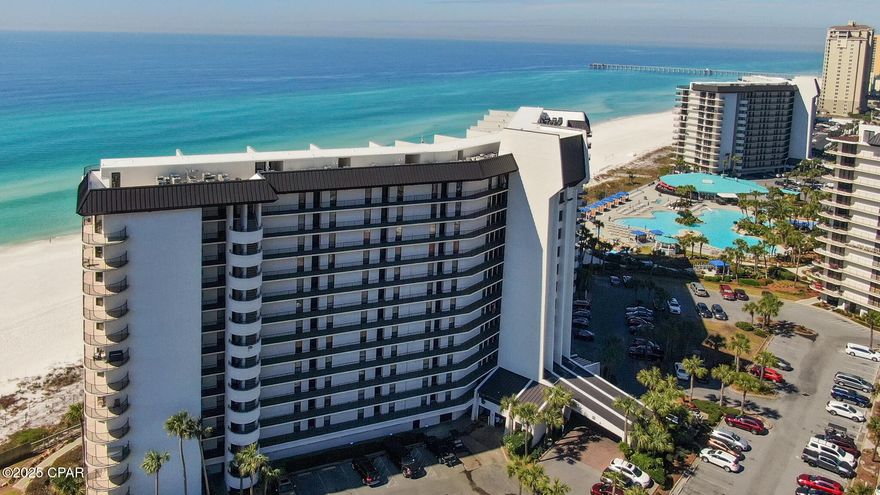 Professional pics coming soon! Welcome to paradise! This beautiful 2 bedroom, 2 bath condo has all the bells and whistles and just in time for summer! No need for elevators in this unit! You are just steps away from the Gulf on the first floor! This unit has also been a non rental so it has been meticulously maintained by owner. Step into this totally renovated unit with floor to ceiling windows in the living room offering a beautiful view of the gulf. An accent wall in the dining room enhances the tones of the gulf and the coastal feel. Updated kitchen with stainless steel appliances and tile countertops create a functional area to fix cuisine while the full length windows display a spectacular view. The 2 bedrooms each feature a update bath with tile shower and granite countertops. Lots of closet and storage space in this unit! A stackable  full size washer/dryer with additional closet space is also a plus another storage closet for all the toys for the beach! Make an appt today to see this one today and all that Edgewater has to offer!