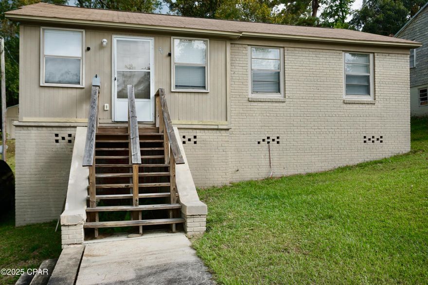 Discover the potential in this solid 3-bedroom, 1-bath brick home located on a quiet street.  The property features a large living area and spacious yard, along with additional storage underneath the home. The washer and dryer are included. Ideal of a starter home, downsizing, or as an investment rental property.  The home is move-in ready and with a little TLC, is ready to shine with your unique vision!