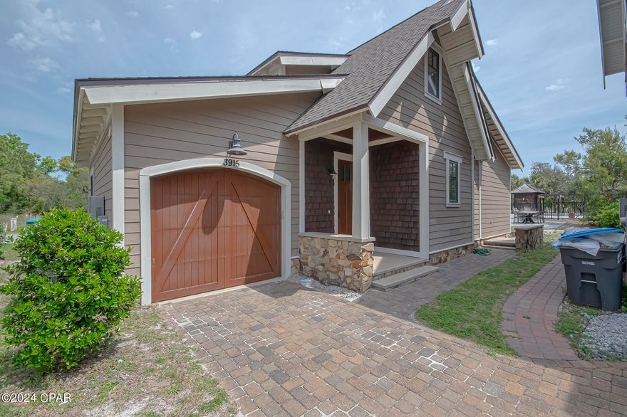 Under Contract - Taking Backups the phrase 'CURRENTLY UNDER CONTRACT, SELLER WILL CONSIDER BACKUP OFFERS. Welcome to this charming bungalow nestled within  gated community Sanctuary Beach. This adorable home boasts beautiful Carrera marble bathrooms, the interior features stylish gray shaker cabinets with lighted glass door accent cabinets, complemented by quartz countertops. Home features a combination of tile and wood floors with high ceiling making the living spaces feel spacious and airy. 

Bungalow is conveniently located next to the community pool providing a perfect spot for relaxation and enjoyment. Sanctuary Beach is a hidden gem and despite its secluded location off Delwood Dr, you'll still be within reach of all the attractions that the east end of Panama City Beach has to offer. Experience the best of both worlds with this adorable bungalow in the gated community Sanctuary Beach.