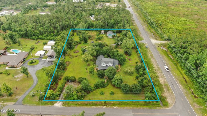 CURRENTLY UNDER CONTRACT, SELLER WILL CONSIDER BACKUP OFFERS Take a look at this custom built home on 2 1/2 acres of land. This 4 bed 2 1/2 bath home has all the room your looking for. The kitchen has brick accents, and all oak cabinets. The Family room has a fireplace and a private phone nook. The Master bedroom is on the first floor, and the other three bedrooms  are upstairs. A large screened in porch, and a double carport. A detached 24x30 garage with workshop. Dont wait, Make this your home today. Note. seller to have carpets professionally cleaned 10/27/23.  All details deemed accurate, if important buyer to verify