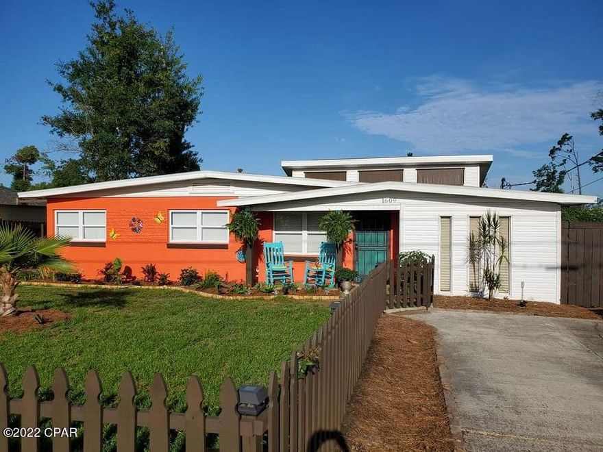 This awesome, 3 Bedroom, 1 Bath, St. Andrews home is a must see!! Along with a newer roof (with solar panel system), this home has been recently updated and is move in ready. The home features an office that could be converted in to a fourth bedroom (already has closet) and has plenty of room for a second bathroom to be added, if desired. The kitchen features newer cabinets with plenty of storage space and newer countertops. The dishwasher was just replaced! Nice, beautiful LVP floors throughout. The large family room is the perfect space for entertaining and leads to your new back yard oasis. The backyard includes a large deck with crank down shades. There is a built-in, above ground heated pool, and standalone hot tub. The grilling area is based on pavers. The back porch also has a mounted TV and a large sitting area for watching your favorite sporting events! There are lights through-out the backyard to enjoy evenings entertaining your guest. There is also a very sturdy shed that can house your outdoor equipment. Home is on city water and city sewer. The home has a tankless water heater. The home has a rear access easement as well for parking in rear. The wide of the home features a gated parking spot for a boat or vehicle. Measurements are approx. if important, please verify measurements.