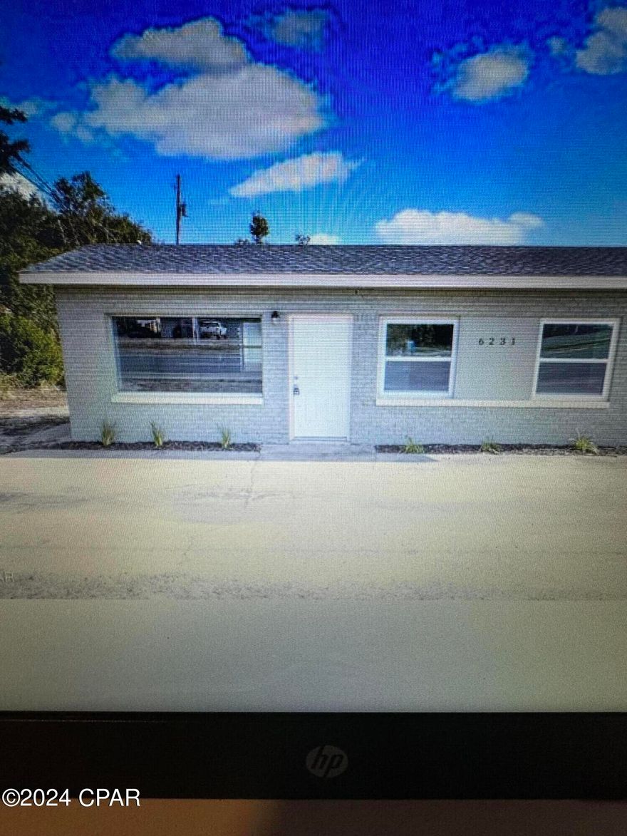 This is the front apartment/commercial building. Will rent either commercial or residential. All new inside ,new paint ,new flooring, new everything. Deposit same as rent. No pets allowed. If commercial it will be a 3 year lease and other rules apply.Call today.