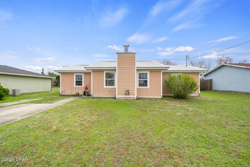 This home is a great find in Panama City! This charming home is conveniently located near top-rated restaurants, shopping, parks, and supermarkets. Featuring a stunning cathedral ceiling in the living room and a desirable split-bedroom layout, it offers both style and functionality. The spacious, fenced backyard is perfect for outdoor entertaining, complete with a storage building that conveys. No HOA restrictions! Convenient to Tyndall Air Force Base, as well as a quick drive to Mexico Beach for sun, sand, and family fun. Plus, you're just minutes from scenic waterfront.