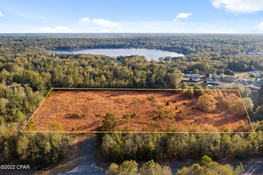 CURRENTLY UNDER CONTRACT - SELLER WILL ACCEPT BACK-OFFERS! Here is the one you have been looking for! This large parcel is completely fenced and has no deed restrictions although it is in the center of Sunny Hills.  It is accessed by a paved road and has a private entrance. Recreational activities are within a short driving distance such as golfing, hunting, boating, swimming and fishing.  Contact your favorite realtor today to make this your future homesite.