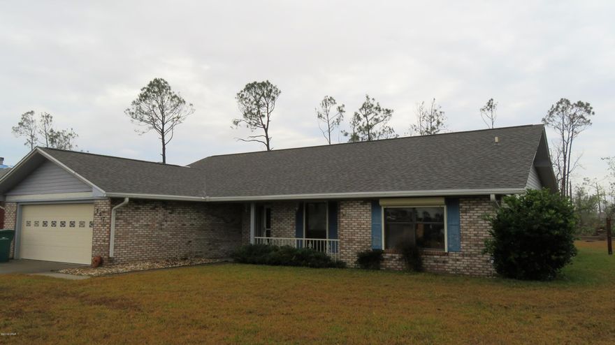Plantation Point home ready for rehab!   This once  beautiful home was damaged during Hurricane Michael and needs some love.  It has an awesome open  floor plan, spacious rooms, a huge Florida Room and a screened porch. A  NEW ROOF  was installed in Dec 2018 . The  Interior has been cleaned up down to the studs and is ready for your sheet rock crew. The kitchen was unharmed and is in excellent condition, together with all appliances. The exterior features electric roll down shutters on all windows. The large lot has been cleared of all downed trees and seller has contracted to have dirt brought in to level out all the heavy equipment ruts in back yard.  This home has a low maintenance brick exterior, with some repairs needed to the vinyl siding, soffits and fascia. To be sold AS-IS