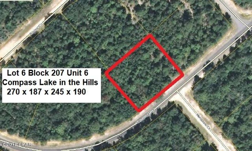 BEAUTIFUL BIG LOT of over 1 Acre with 270 feet of roadfront on Paved Vancouver Dr less than 1 mile from POA Main Lodge on Compass Lake. This lot is Level, Dry, and has Big Nice Trees making it an ideal Homesite. Modular or Site Built Homes only, no Mobile Homes in this area of development. Conveniently located about 15 minutes South of Interstate 10 at Marianna, and about 40 minutes North of Panama City for Shopping, Restaurants, Entertainment, and Beautiful Gulf Beaches. As an owner in this development you have access to Private McCormick Lake for Swimming, Fishing, Canoeing, Kayaking, etc, as well as the Main Lodge on Compass Lake with Swimming Pool, Tennis Courts, Horseback Riding, etc. Come enjoy the Quiet Peaceful Lifestyle at Compass Lake in the Hills today.