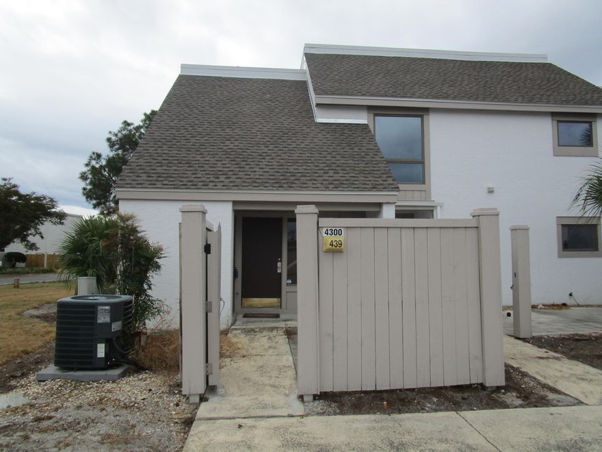 Currently under contract, seller accepting backup offers. This 2 bedroom, 2 bath, penthouse unit is waiting for someone with vision to grab it. The association will have the sheetrock hung and finished. The new owner will finish the unit. Located in the gated community of Bay Point. Bay Point features a championship golf course, restaurants, clay tennis courts, 24 hour roving security and an on site Sheraton Resort hotel.

There are liens on all golf villas I units. Until they are resolved, the unit can't close.