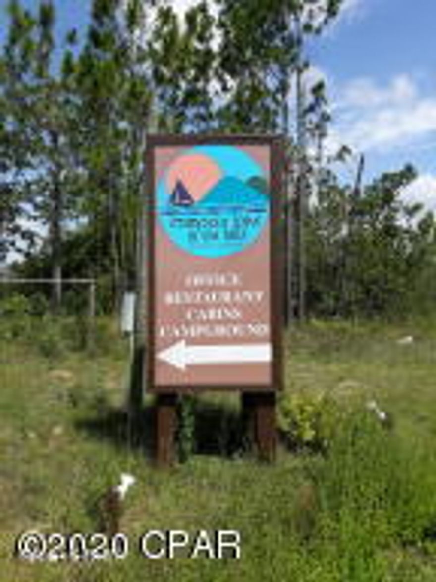 Great building lot in Compass Lake in the Hills. This community south of Marianna offers a lot of amenities to the owners. There is a clubhouse with swimming pool, RV spaces, access to 2 large lakes, fishing, water skiing and pavilion. Kayaks, canoes and fishing boats are available for rent to land owners.