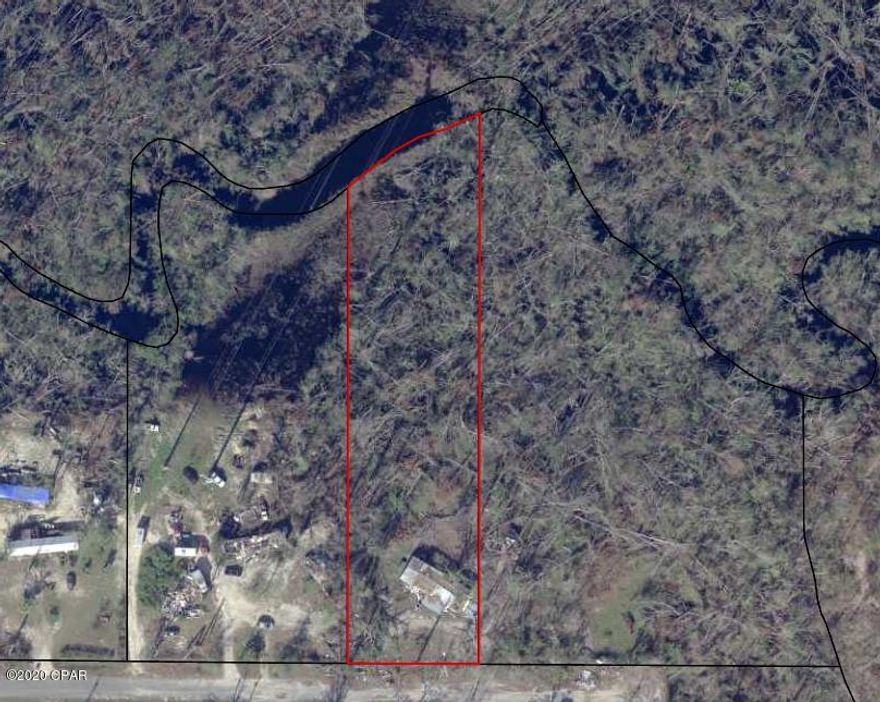 Private country living within a 10 minute drive to city life to all the shopping and amenites of Panama City. This large beautiful lot is ready with utilities already built in, gravel driveway, and a large slab for your Pole Barn. This lot is located near a dead end so no through traffic noise or congestion.



The over sized wooded lot has Bayou George Creek running through its back portion. At one point you could navigate all the way to Deerpoint Lake from it (should verify if important)



Front 1/3 and buildable portion of lot in Zone X.