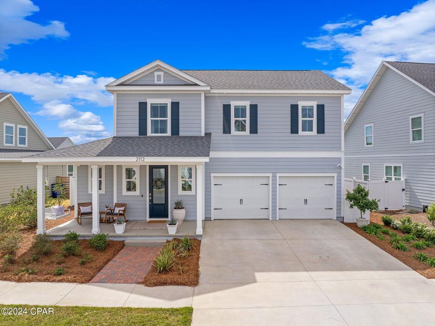 Welcome to this immaculately maintained 4-bedroom, 3.5-bath home in the highly desirable SweetBay neighborhood of Panama City! Featuring a stylish kitchen with a gas range, wood range hood, quartz countertops, and stainless-steel appliances including the refrigerator and built in microwave. Enjoy the added benefits of an electric vehicle hookup, blinds, fully fenced yard, and guest parking located just across the street. No details were missed in this spacious floor plan with a first-floor primary bedroom, upstairs loft, and open layout for entertaining guests. The primary bedroom feels luxurious with soft carpet, tray ceilings, double vanities in the bathroom, tile flooring, a large shower and dual closets. This home is located within a quick walk to the impressive community pool. Other community amenities include the dock, basketball court, playground, picnic area, and fishing, catering to various interests. Exterior features include a sprinkler system,  2-car garage, and covered patio. Experience comfort and convenience in this centrally located Panama City residence! Buyer to verify any information deemed important.