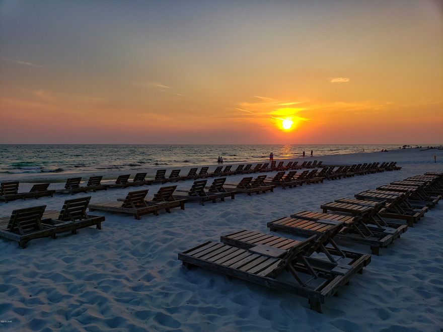 $31.5K GRI through Vacasa for 2019. New Hot Water Heater Jan. 2020. This 4th floor unit in Sterling Breeze is LIT and in the heart of the Tourism District of PCB. Within walking distance of Pier-Park & Russell-Fields Pier. The unit has Earth toned décor throughout, so it has a home away from home ambiance with beach accents. Tile flooring adorns the entire unit for easy maintenance & care. Living Room & Bedroom Tile Flooring looks like Hardwood Flooring. Open Concept Floorplan where the Kitchen & Living Room are open to one another with Gulf views. The Balcony features a built-in Electric Grill. The unit can comfortably sleep & formerly serve, up to 4 adults & 2 children. The floorplan is popular with Prime Season, short-term rental vacationers & Off Season month-to-month ''snowbirds''.