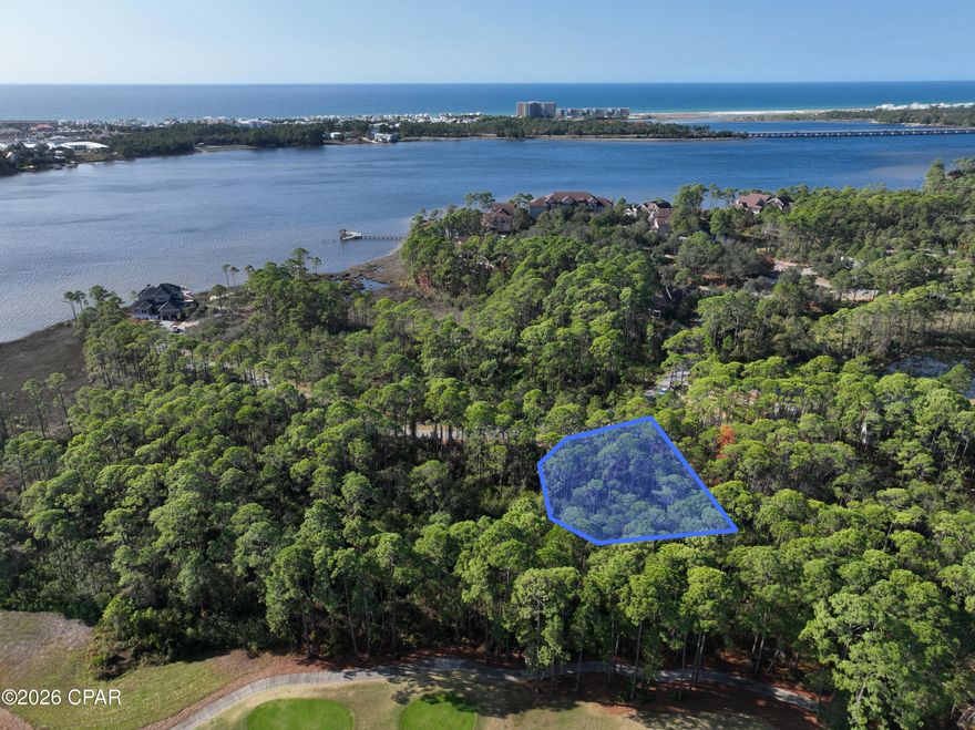 Beautiful lot in gated waterfront community. Protected lands to the back and side of lot.  Elegant neighbourhood with so many amities.  Pool, park fire pits, boardwalks on the lake.  Boathouse and community room for gatherings.  This lot is a short walk to the lake but still tucked aways from all the traffic. 

Listing agent is owner of lot.