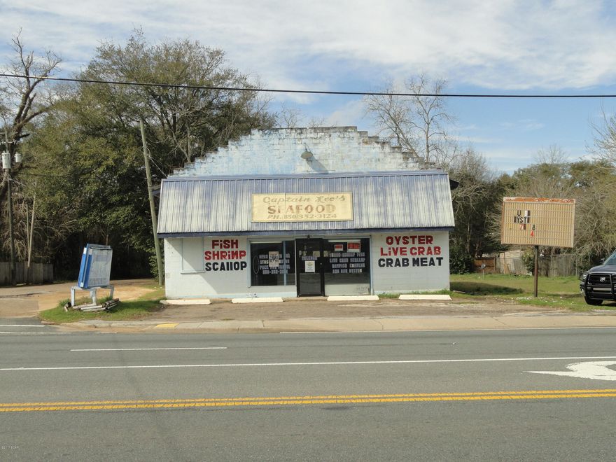 This Building was used for over 30 years as a Fish and Seafood Market.  Very successful business location. Convenient to Hwy 231 and 90.  3 Miles to I-10.  Coolers are still installed. Comes with a lot in rear of property with a mobile home that is rented​​‌​​​​‌​‌​​​​‌​​‌​​​​‌‌ out.