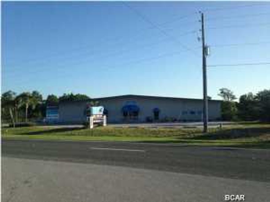 WOW !! 33,000 SF ON 3.5 acres with 225' on the Pkwy and only one mile East of Hwy 79 and less than 15 miles from the Airport and 10 miles from 30-A. Building is fully leased with long term leases. Building was built in 1996 and is zoned commercial on the front and Light Industrial on the back. Property has great exposure and easy access via the Pkwy and a Median cut, plus back access via Beach Commerce Park. The building has 16' eave height, three (3) loading bays with 14' x 16' roll up doors. In addition, has a large 20' x 16' with ramp loading door on the North side. The major tenant White Capps has been at this location for 10 years and the other two tenants just signed new five (5) year leases in 2013 with rent increases. An additional +/- 1.4 acres which is fully permitted with