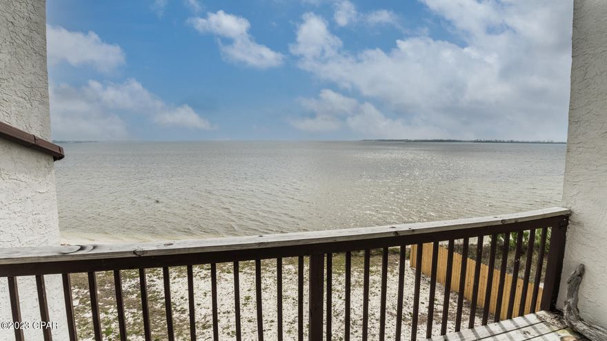 This beautifully remodeled 2 bedroom, 2 1/2 bath BAY front townhomes with 1 car garage is AWESOME. Views are endless. Owner pulls his boat right up to the property on boating days and loads it up washes it down there at the end of the day. It comes with a security system. A large walk out deck off teh living room and a second deck off the the bay front bedroom. Sun rises are the best from inside or outside of this property. New roof in 2019.