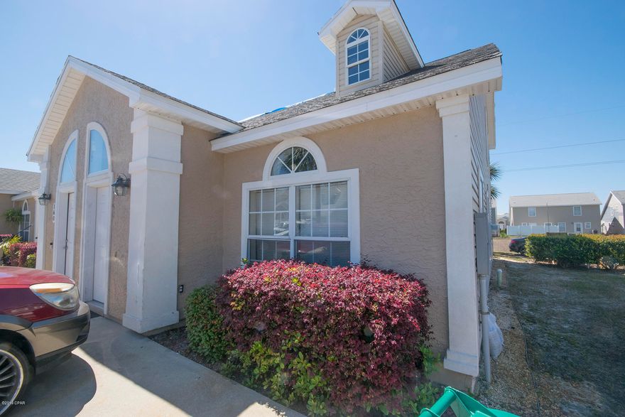 158 White Cap Way, Palm Cove @ Panama City Beach. A gated community with two pools, guard house, plenty of common area and quiet streets that are golf cart and pedestrian friendly. The home features three bedrooms, two full baths and one half bath and only one neighbor as 158 White Cap is a corner residence. Located a short distance to the Gulf of Mexico, Pier Park and many restaurants and attractions, White Cap Way is ideal for rental investment as well as a primary owner. Over 1,400 square feet, pool, gated, located on PCB for this price range it is a hot item! Added bonus is the brand new roof and this is one of the only homes in Palm Cove with a back porch! Come visit today!