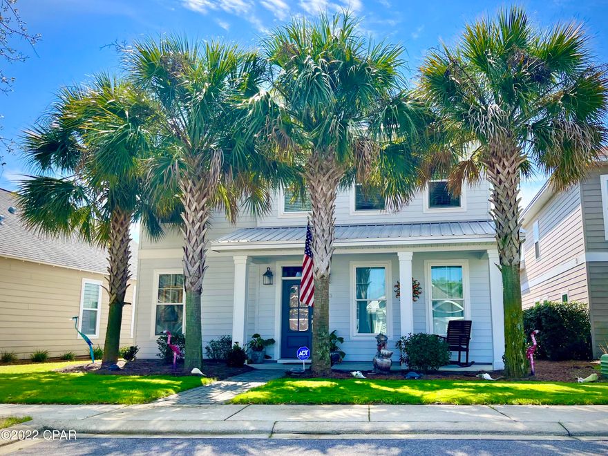 Make your home in this five-bed, two-and-a-half-bath Florida cottage in Turtle Cove, an exclusive area on Panama City Beach's west end conveniently located near shopping, dining, recreation and public beach access. Built in 2014, this 2,500-sq.-ft. home features an owner's suite with spa-like en suite bath with soaking tub on the first floor and spacious living areas on both. The open floor plan throughout flows into a well-appointed kitchen with custom cabinets, granite countertops and stainless steel appliances. A two-car garage features private entry in the rear of the home. Enjoy new carpet replaced in early 2022 as well as tile flooring throughout the home. Turtle Cove features a community pool and hot tub, clubhouse, tennis court and a lakeside pier on Lake Powell, the largest coastal dune lake in Florida and North America.