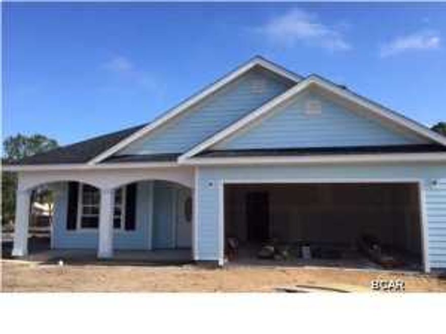 BEAUTIFUL, NEW HOME in Open Sands AND less than .25 miles to the beach! South of Hwy. 98 so just an easy stroll, bike ride or golf cart away! Besides being close to the beach, there is no association fee! Want to be close to our new shopping mecca Pier Park, entertainment, movies, Frank Brown Sports Center, Aquatic Center because EVERYTHING IS JUST MINUTES AWAY! Notice immediately the charming exterior complete with landscaping, sprinkler system, soothing colors, and covered front porch! When not playing at the beach, relax out back under your covered patio and enjoy the comfortable sized yard, perfect for a beach home and hard to find in newer developments. Now, stepping inside, WOW! You fall in love! Notice the beautiful upgrades which are already included in your price! Nice