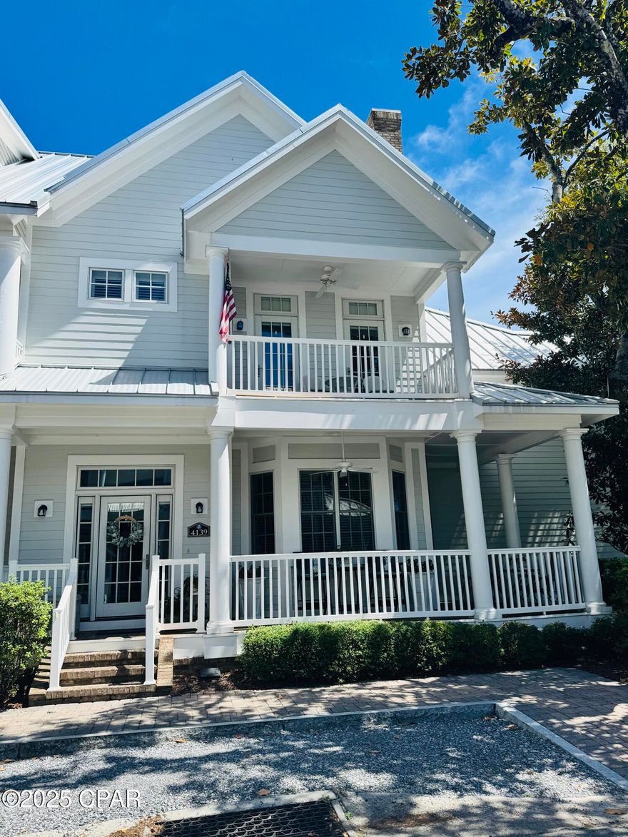 This beautifully updated 3-story townhome in the gated Waterhaven community offers just the right mix of style, comfort, and TONS of storage—with over $50,000 in upgrades and a bonus in-law suite over the garage. Inside, you'll find a comfortable and charming living space with gas fireplace. The main kitchen is a dream for anyone who loves to cook (or just entertain), featuring an extended island, new countertops, added cabinets and shelving and top-notch appliances—including a Viking range and Subzero fridge. There's even a beverage fridge and ice maker at the wet bar for easy entertaining. The laundry room also has room for an office and additional pantry space.

French doors off the dining room lead to a cozy private courtyardgreat for relaxing with a book or hosting friends on warm evenings. Upstairs on the second floor you'll find the master suite with newly remodeled ensuite bathroom and private balcony. The guest room with ensuite bathroom is across the hall with its own balcony overlooking the courtyard below. The third floor boasts another guest room with ensuite bathroom and even more climate controlled storage closets! The real bonus? A private carriage house above the two-car garage with its own full kitchen, bathroom, and sitting area. It's perfect for guests, family, or even a quiet home office. Furnishings in carriage house are negotiable.

As a Waterhaven resident, you'll also have access to a ton of resort-style amenities: a bay front pool, huge private pier, private boat slips, clubhouse with theater and fitness center, outdoor grilling stations, and a spacious gathering room for events. This community truly is a gem on the emerald coast and you're sure to feel right at home.