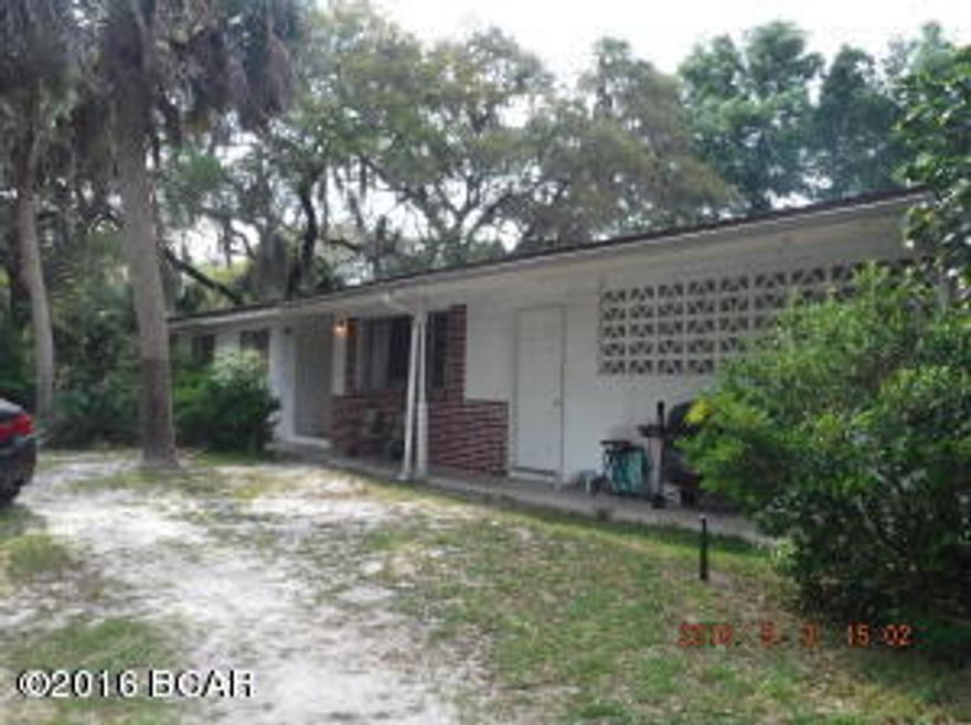 SELLERS MOTIVATED! WILL CONSIDER OFFERS! Waterfront property in Southport on Fanning Bayou. This is a 1.14 acres property with approx. 171' on the water. You do have bay and gulf access from this bayou and the seller says the county has plans to dredge the bayou this year. There is a brand new metal roof. The home is solid block construction and includes 3BR/2BA and a lockout bonus room with a half bath. The terrazzo flooring is in great shape and there is a wood burning fireplace. Fruit trees and other lovely flora dot the landscape giving this property an Old Florida vibe. Beautiful piece of waterfront property and you're just minutes from Lynn Haven and Panama City. There is a new metal roof in place. All info is approx. and must be verified by Buyers if important
