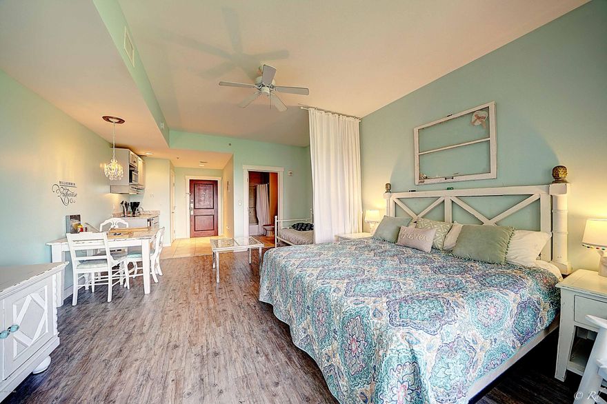 What a great studio! Shabby coastal chic decoration and sold fully furnished. RENTAL READY! Located in the popular Origins At Seahaven and just across the street from the Gulf, Sharky's beachfront restaurant and Gulf World. You are close to Pier Park with shopping, restaurants, family entertainment and other popular area attractions. This unit boasts a nice sized balcony with an excellent view of North Bay. Enjoy breathtaking Gulf views from the common areas including the sunset and pool deck! This unit is being sold ''rental ready'' for a buyer who might be looking for a vacation rental or to enjoy everything this unit and property has to offer!