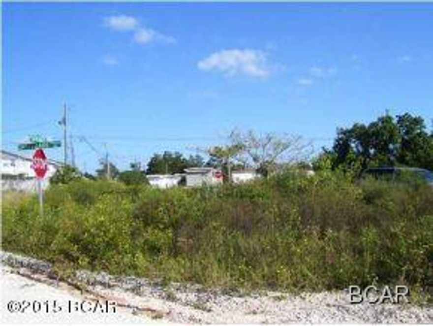 Great vacant lot on the south side of Hwy 98 in Laguna Beach on the west end of Panama City Beach, Florida.  There are three lots for sale right next to each other.  Buy all three and the price will get even more negotiable.  Seller is ready to sell.  Bring an offer today!