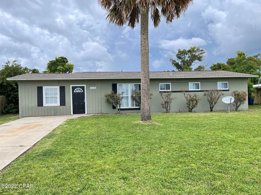 It's a great place to call home! Don't delay, look at this home today.  Nice 3 bedroom, 2 bath home  with  new carpet in the master bedroom, 2nd and 3rd bedroom carpet just one year old.  The LVP flooring in the living room, dining/kitchen and den, bonus room, is only one year old as well.  The water heater with expansion tank is new and the refrigerator and dishwasher are just a year old.  Convenient location just off of 23rd St. and near good shopping, hospital and just a short drive to Panama City Beach.  All sizes, age, information is approx and should be verified by the buyer.