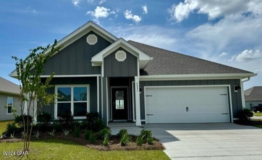 New construction home in Titus Park, located in Panama City. This Rhett floorplan is situated on a corner lot at 4897 Sweetspire Drive, Lot 195. This home is a 4-bedroom 2-bath, an open concept floor plan, with 1,835 sq.ft. The Rhett floorplan has upgraded finishes throughout. You will find 9-foot ceilings with 10-foot trays and beautiful crown molding. The Rhett also has EVP flooring, quartz countertops, a large kitchen island with cabinetry on both sides underneath and brushed nickel hardware. This floorplan has energy efficient windows to allow lots of beautiful natural light. The primary bathroom has a beautiful garden tub, perfect for relaxing, and a spacious shower with a glass enclosure.  Titus Park is in Panama City, Florida and is only minutes away from Tyndall Airforce Base! This large-scale multi-phase community is located off Highway 390 at Highway 231, centrally located for an abundance of shopping, restaurants, and great schools! Beautiful white sands beaches are just a short drive from your doorstep. Access the bay for fun and fishing by use of the public boat ramp only 3 miles away. There is a new Publix shopping center across the street from the community entrance. Titus Park highlights some of the most beautiful floorplans, which have amazing features.