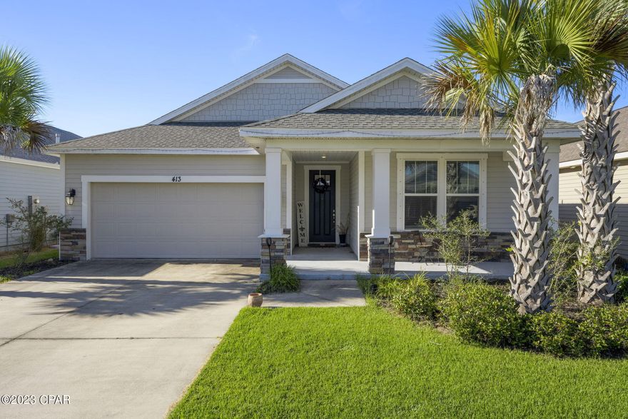 Beautifully maintained and landscaped Samuel Taylor Home with a hot tub in the covered patio.  The refrigerator stays along with a nice wooden children's play set. Located within a short walk to Breakfast Point Academy. Fenced back yard. Plus cable outlet on patio for even more outdoor entertaining. This Trigger plan includes window trim in the main areas.  Quartz counter tops through out.  Luxury Vinyl Plank flooring in the main areas and utility room. Tile in both baths. If you have been waiting for an opportunity to live in Breakfast Point then don't miss looking at this light and bright home!