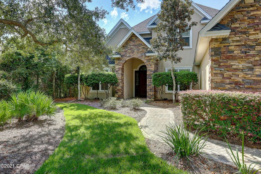 Panama City Beach home in the Preserve with a pool! Interior features include tall ceilings, granite counter tops, plenty of kitchen cabinets, gas cooktop, & whole home surround sound. Spacious master suite includes bathroom with two vanities, large tub, separate shower, & large closets. Living area boasts a wet-bar with a wine fridge, built-in cabinets, gas fireplace, and a view of the beautiful pool area. The upstairs opens up to a spacious loft, includes 3 bedrooms and 2 bathrooms, and a bonus room. The 4th full bath leads to the pool area. Exterior features include new roof installed after hurricane, 3-car garage, fully fenced back yard, brick paver driveway, & lush landscaping.