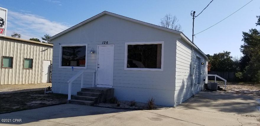 Great location and signage. High traffic area. On septic system, has long driveway to back of property. If interested, we have 2 other vacant lots on same side of street that could be used for additional parking or storage at an additional cost. The lease will be a 2 year triple net with sales and use tax. Base rent plus triple net and tax will run about $2000.00 a month