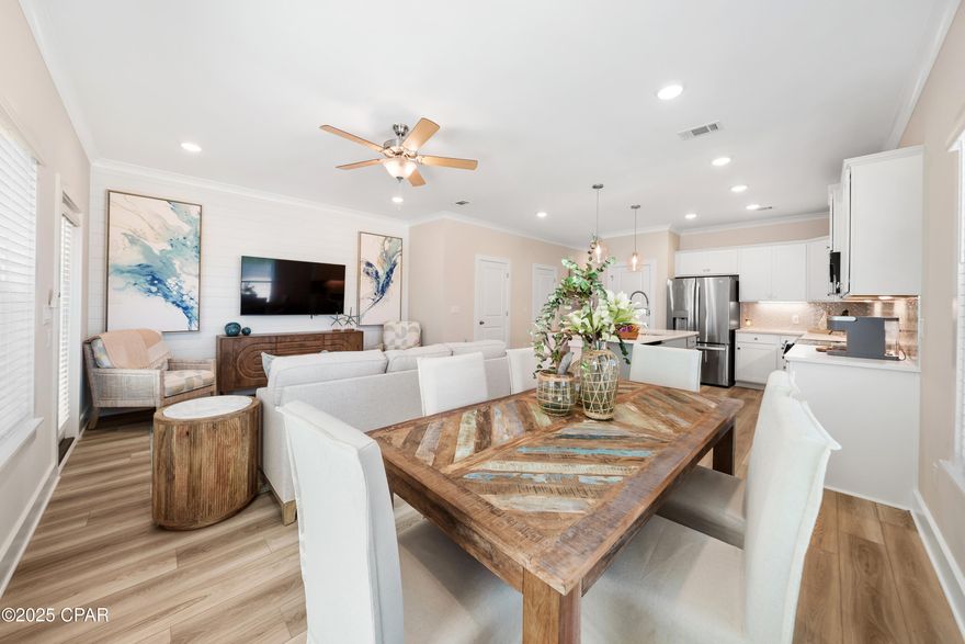 NO RENTAL RESTRICTIONS!!! Our stunning pool is NOW OPEN! The prefect place to SOAK UP THAT Florida SUN! Seagate at Clara is a new townhome community nestled in the vibrant city of Panama City Beach, FL. This two-story unit features board and batten exterior and covered entries. One car garage provides a great space for storing beach essentials. This open concept townhome boasts a stylish kitchen with white cabinets, tile backsplash, a large island with quartz counter tops - perfect for entertaining.  The elegant Owners Suite is designed with comfort in mind showcasing a large walk in closet and double- bowl vanities. Main Bath has tiled shower.  All bathrooms have quartz countertops.  LVP is located throughout the home.  The community pool features a cabana, lounging, seating and grilling stations. This community has a dedicated dog park. Seagate at Clara is in a prime location, approximately 1.4 miles to the sandy beaches and just minutes from Pier Park.