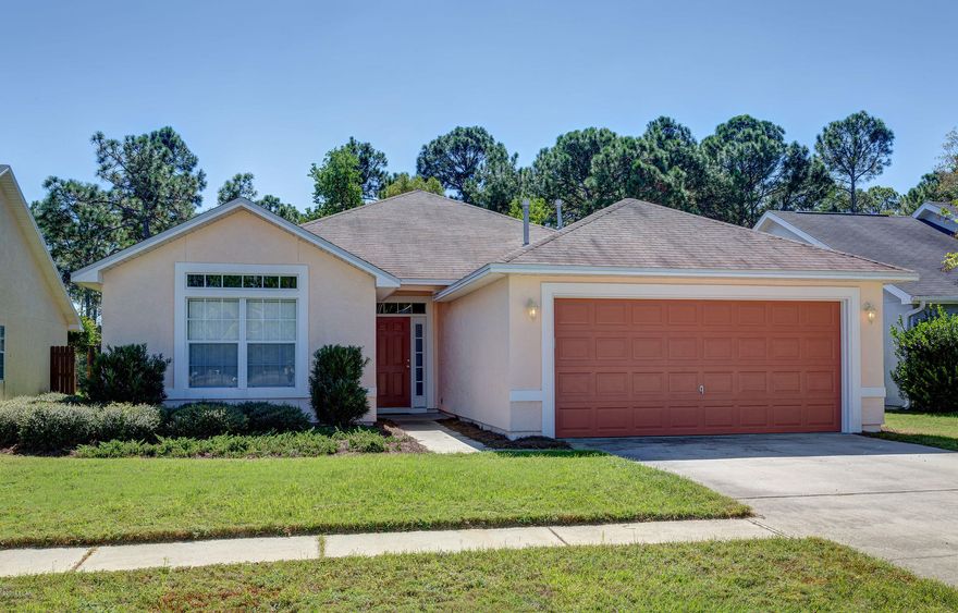 SELLER TO PAY UP TO $6000 OF BUYERS CLOSING COSTS WITH AN ACCEPTABLE OFFER. Well-kept 4 Bedroom home in the Magnolia Place subdivision.  The home has an open floor plan with cathedral ceiling, a gas fireplace, and laminate wood floors in the living room/dining room area. The Eat-in kitchen features tile floors, newer stainless appliances, breakfast bar, and overlooks the beautifully landscaped back yard oasis. The large backyard features- a hot tub, storage shed, dog run, covered and uncovered paver patio, sprinkler system with water tubes for the plants, and it is fully fenced. The master bedroom features cork flooring, private bathroom, and a walk in closet. The 3 additional bedrooms share the second bathroom. Off the kitchen is a walk in room laundry room and pantry leading to the 2 car garage. Magnolia Place subdivision offers underground utilities, street lights and sidewalks. Located near the Hathaway bridge it is convenient to town and only a short drive to the World's Most Beautiful Beaches. The home is not in a flood zone. Age, Square Footage and Room Sizes are approximate, if important to buyer please verify.