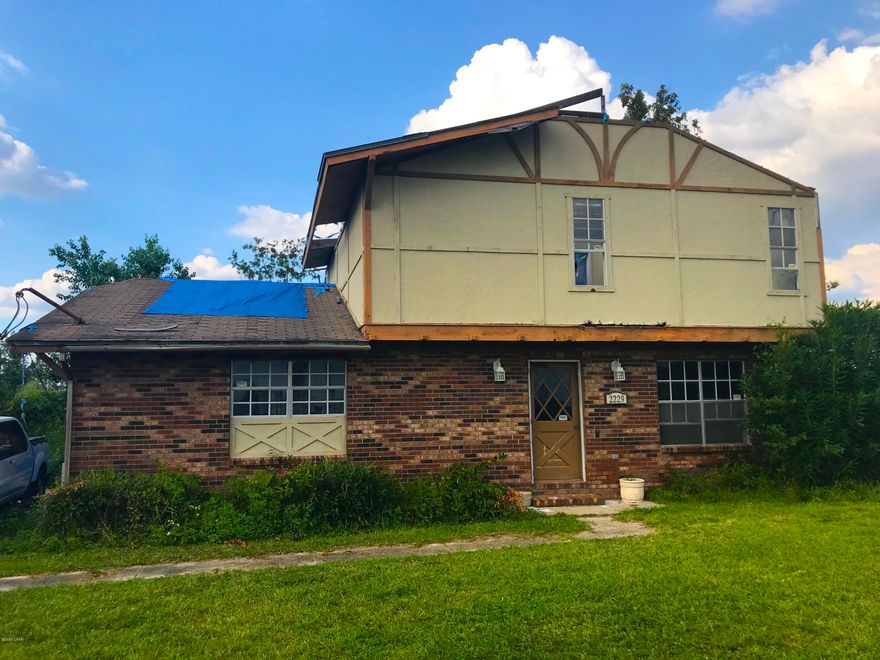 AMAZING fix & flip or investment opportunity with this 4 Bedroom / 2.5 Bath home in the HIGHLY SOUGHT-AFTER NEIGHBORHOOD of College Point in Lynn Haven! This large brick home is 2,143 sqft. (heated) and 2,869 sqft. (total). It has some great features including a huge in-ground POOL in the backyard, brick fireplace, picture windows and curb appeal; And, as you can see in the pictures, it was damaged by Hurricane Michael and will need renovation, including truss work on the 2nd floor, some gutting, roof, debris, etc. - There is quite a bit that needs to be done. But at this price, IT IS A STEAL! IT DEFINITELY WILL NOT LAST LONG - So act quickly!  --- CASH BUYERS ONLY ---