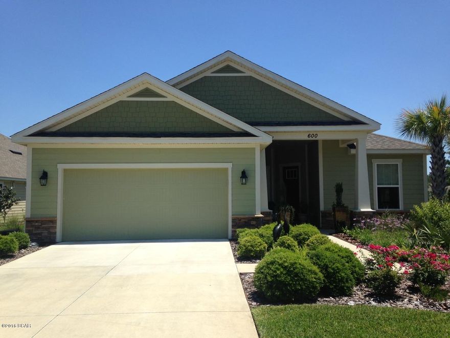 Gorgeous former model home next to a park for sale! The owners of this popular 4 bedroom with an office, 2.5 bathroom Pompano model have added a fully fenced and screened-enclosed, beautiful salt-water heated pool just off the 30' x 10' covered back patio and outdoor kitchen space - perfect for entertaining guests or a relaxing oasis and private sanctuary. This home has been updated with crown moulding throughout the entire home, elegant pendant lights, fresh paint and additional natural landscaping in the front and back of the home. All windows have luxurious roman shades. The kitchen has a large, flat granite-top island that can comfortably seat 4 people next to a dining area that is large enough to sit 6 additional people. If you like to entertain friends and family, this is your home!