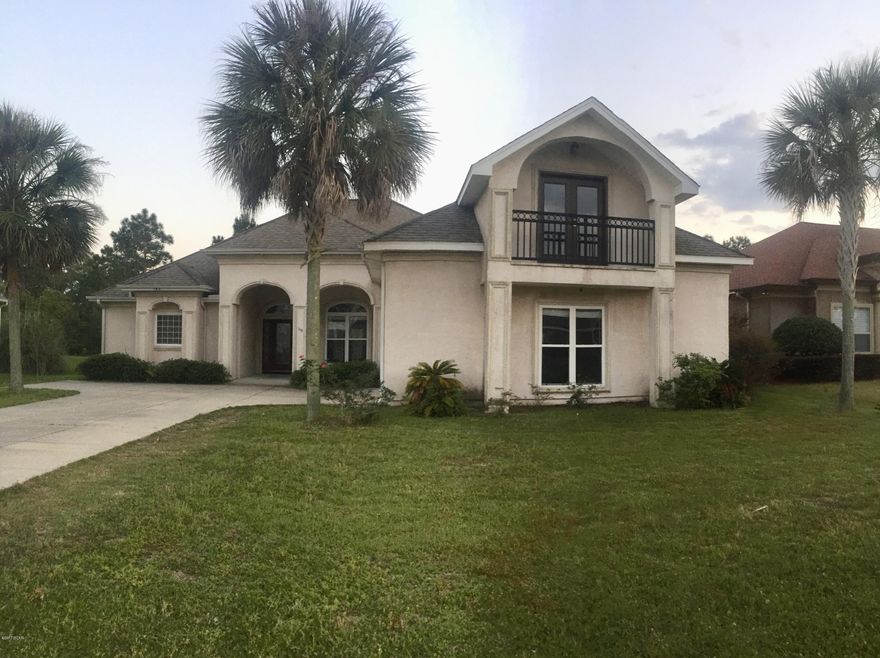 Here's an unbelievable opportunity on a large 4 BR home in the Panama City Beach area, less than a half-mile  to the beach.  This 2756 SF home is located in the highly sought after, Golf Course Subdivision:  The Glades, home of The Hombre Golf Course.  This home has high ceilings, crown moulding, granite counters and plenty of space.  There's an oversized 2 car garage for parking, plus a 2nd floor bedroom and bath, perfect for a ''Teen Suite.''  Hurry, this one will go fast. (All info is approximate and buyer to verify any info that is important, including dimensions, schools, condition, etc.)