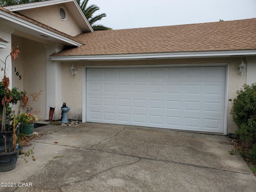 CURRENTLY UNDER CONTRACT, SELLER ACCEPTING BACKUP OFFERS Beach living is the best! Pleasant Grand Lagoon Shores cul-de-sac close to the beach. Is beach living on YOUR bucket list? Ought to be! Come check out this lovely split plan. Walk-in closets both bedrooms. Plenty of storage & the living-dining combo offers a large space for entertaining family and friends. Not one but 2-car spacious garage! Near the glorious Emerald Coast Beaches, St. Andrew State Park, wildly popular Pier Park & so much more! Call today for your in-person or video-walk-thru showing. Home has had life-time warrantied settling repair by Alpha Foundations. Whole home has been freshly painted. Kitchen & baths need a little updating. Hop on it, y'all!