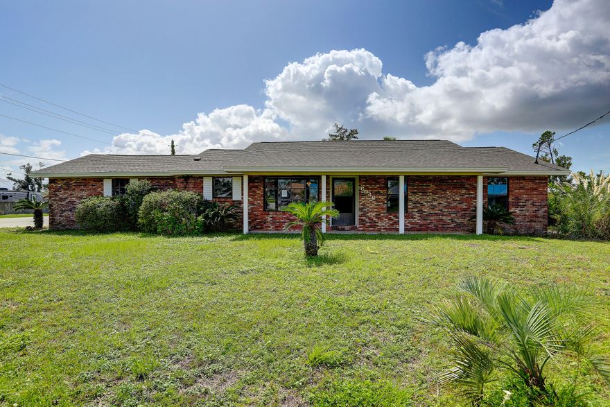 Large corner lot. Great starter or retirement home. New roof and flooring. Large sunken family room w/large brick fireplace, formal dining area & breakfast area as well off kitchen. This home has a great open concept. Please verify all dimensions and information for your buyer.