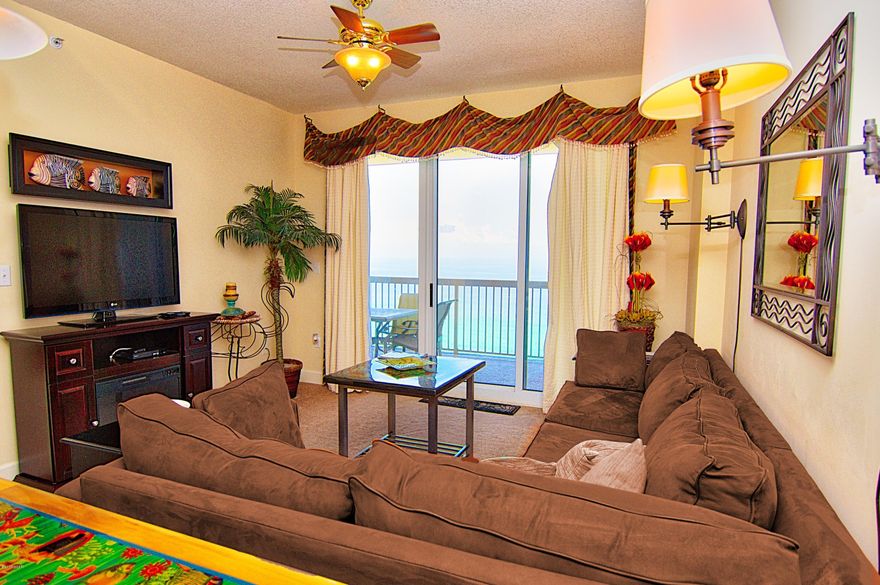 Best Price on a Rare 1BR Sunrise Condo! New $3,000 HVAC! Looking for 1BR condo that includes: (1) Master Bedroom on the Gulf. (2) Separate Bunk Room. (3). Two Full Baths (4) Parking Underground. (5) Great Rentals (6) Jetted garden tub... This condo has been beautifully decorated with a gorgeous king master overlooking the Gulf and large en suite with double vanity and oversized jetted garden tub. It also has its own direct balcony access. It also has a separate and large bunk room just off the entry hallway. It has 2nd full guest bath and a sleeper sofa, which is ideal for a family of 4-6. The gourmet kitchen features granite counters and upgraded cabinets.

The Sunrise Beach Resort is one of the few with covered parking in the garage under the building (NO NEED TO PARK ACROSS THE STREET!) Looking for 1BR condo that includes: (1) Master Bedroom on the Gulf. (2) Separate Bunk Room. (3). Two Full Baths (4) Parking Underground. (5) Great Rentals (6) Jetted garden tub... This condo has been beautifully decorated with a gorgeous king master overlooking the Gulf and large en suite with double vanity and oversized jetted garden tub. It also has its own direct balcony access. It also has a separate and large bunk room just off the entry hallway. It has 2nd full guest bath and a sleeper sofa, which is ideal for a family of 4-6. The gourmet kitchen features granite counters and upgraded cabinets. This condo  has a seasoned rental history.
The Sunrise Beach Resort is one of the few with covered parking in the garage under the building (NO NEED TO PARK ACROSS THE STREET!)...

The Sunrise Beach Resort is centrally located to all the dining and entertainment PCB is famous for including spas, shopping, golf, fishing and more! Sunrise Beach has amazing resort style amenities, including: 346 feet on the Gulf of Mexico, Gulf front exercise room, 2 Gulf front swimming pools, 2 Gulf front jacuzzi's, children's mushroom play fountain, BBQ area with gas grills and more! 
Finally, the Sunrise HOA fees are among the most affordable on the beach and they even include full wireless internet throughout the resort. Sunrise is also owner controlled, which means the homeowners own the gym, the pools, and receive the income from the beach chairs, etc! And, HOA fees are some of the lowest on the beach. NOTE: ALL INFORMATION AND MEASUREMENTS ARE DEEMED RELIABLE HOWEVER NOT GUARANTEED. BUYER SHOULD CONFIRM ALL INFORMATION.