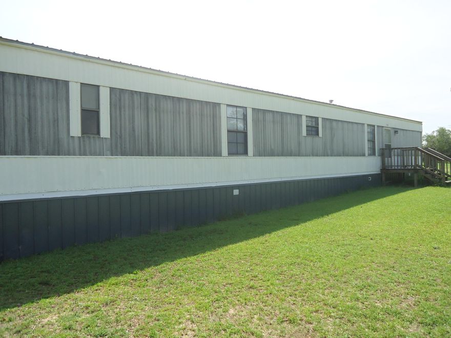 Own your very own Mobile Home Park that has five homes and one storage trailer on site.  This Park is just a short distance from Hwy231/Kynesville.  With just a little fixing this could be a Money Making Machine.  Currently there are no tenants and no outstanding leases so you can start fresh.  With County Approval, looks like you could possibly add additional units.  These units have been well maintained in the past and just need a new and motivated owner.  Rental potential is at all time high.  All measurements are estimated or from property appraiser site.  Owner financing available with substantial down payment.