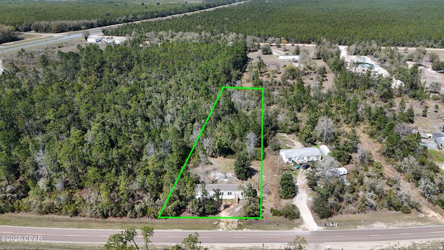 Spacious rural property on nearly 1.4 acres located on Hwy 167 in Fountain, FL. Home features recent updates including new paint, new flooring, new skirting, new appliances. Property is equipped with a septic system and  new well pump installed. Enjoy peaceful surroundings with easy access to main roads while maintaining privacy and open space. Ideal for a homesite or investment. Conveniently located within 45 miles to Panama City Beach. Buyer to verify all measurements. No HOA. Ask about lender credits available and zero down payment options.