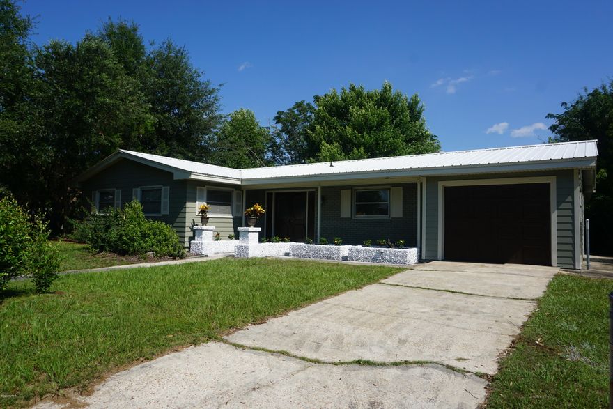 Completely remodeled beautiful home located in the Sunny Hills Subdivision just North of Panama City Beaches. This home is within 2 miles of the golf club & 1 mile from boat ramps of Boat lake & Gap lake. Enjoy the peace, tranquility & convenience to town & only minutes to the new airport. 3BR/2BA, this home features NEW kitchen cabinets & granite counter tops w/ plenty of cabinet space & 2 pantries. Living & dining room open to each other & then to the spacious Florida room; which is great for entertaining. Master bedroom has a walk-in closet & en-suite bathroom w/ new vanity. Florida room has tiled flooring & a portable cooling system that makes a great place for relaxation. The yard is completely fenced- perfect for pets or children to play. Also has a metal roof & exterior storage room