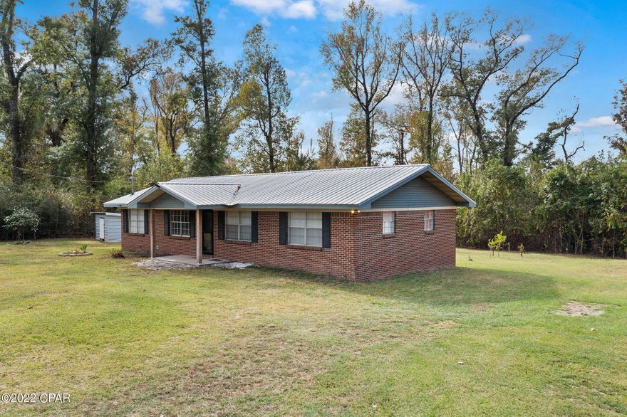 This well-maintained brick beauty sits in a relaxed, country setting just minutes from town! Inside you will find a spacious living room open to the eat-in kitchen with island, 17x11 bonus room featuring wood burning stove, 3 bedrooms and a recently updated bathroom. Enjoy your time outside watching the sunrise from your covered front porch, grilling on the back deck or tinkering in the 24x36 barn complete with 2 roll up doors. Home is situated on 1.1+/- acres atop of Orange Hill close to Hwy 77 and 231.