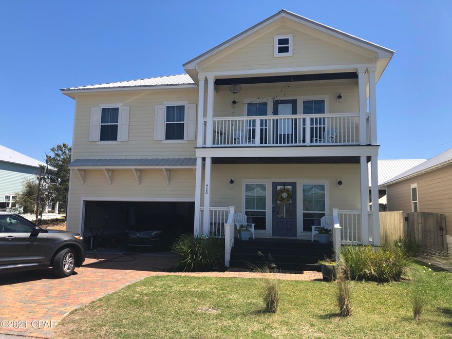 Gorgeous Family home, in the desirable gated community of Paradise Grove, complete with community pool. Custom Hardwood cabinets, and granite counter tops in the kitchen, Spa soaker tub in the master bath, as well as his and hers walk in closets.  Close to Pier Park, and the airport. Professional photos coming soon.