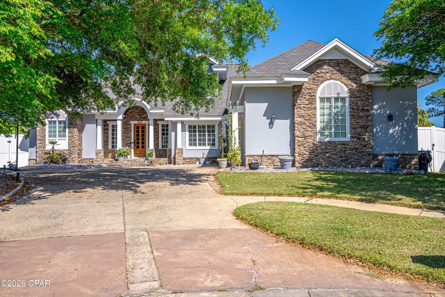 OPEN HOUSE SAT, 4/18 12PM-3PM
Welcome to this exceptional custom home, built by a renowned local builder and proudly featured as a Parade of Homes showcase property. Prepare to be captivated by its distinctive architecture, thoughtful details, and undeniable charm.
This remarkable residence offers breathtaking marsh views that serve as a serene, ever-changing backdrop for everyday living and unforgettable entertaining. Nestled beside the sparkling pool and spa, the sweeping marsh vista invites you to unwind while watching tall grasses sway gently in the breeze and birds glide gracefully overhead -- pure Florida tranquility at its finest.
Step inside through the elegant beveled-glass front door and be greeted by the rich warmth of Australian cypress hardwood flooring that flows throughout the main living areas. The thoughtfully designed open-concept layout with 10ft ceilings seamlessly connects the living, dining, and kitchen spaces, creating a warm and inviting atmosphere perfect for both relaxed family nights and lively gatherings.
The master suite is a true private retreat, complete with his-and-hers closets, with hers beautifully lined in fragrant cedar. The newly renovated master bath from 2024 features dual vanities with granite countertops, a spacious walk-in shower, and a luxurious standalone soaker tub -- your personal daily spa experience.
The chef's kitchen, fully renovated in 2025, is a standout highlight with premium appliances including a Wolf range, a European-style custom hood, and a top-of-the-line smart refrigerator. Additional luxuries include a convenient pot filler, a warming drawer, a generous quartz waterfall island, and a butler's pantry with a second refrigerator and desk. The adjacent laundry room adds everyday convenience.
Upstairs, you'll discover a versatile media area, mother-in-law suite, or apartment featuring built-in cabinetry and a full wet bar with beverage cooler, microwave, and sink. An adjoining bedroom and full bathroom offer flexibility, easily used as a guest suite, private office, or even a home gym thanks to the reinforced flooring and mirrored wall. Both rooms were updated with LVP flooring for the bedroom and durable, pet- and stain-resistant carpet in the spacious living area.
Outside, the resort-style backyard is an entertainer's dream. Enjoy the saltwater heated pool with raised spa, soothing stone waterfall, and brand-new screen enclosure. The area is finished with fresh pavers, Trex decking around the spa, and a built in Big Green Egg and a natural gas grill -- perfect for year-round outdoor cooking and gatherings.
Additional premium features include an oversized two-car garage that comfortably fits two full-size vehicles, an oversized golf cart, plus two large storage closets. A Versa-Lift dumbwaiter in the garage provides effortless access to expansive attic storage for all those holiday decor items. The house is also insulated with Icynene spray foam for superior energy efficiency and comfort throughout, while sound-insulated interior walls ensure exceptional privacy and quiet. The home is equipped with surround sound speakers indoors and outdoors for immersive audio wherever you are.
This is more than a home -- it's a lifestyle. Exceptional craftsmanship meets thoughtful luxury in a setting that feels like a private resort.
Don't miss your chance to own this one-of-a-kind custom masterpiece. Schedule your private showing today and experience the magic in person.
All sizes, measurements, and details are approximate. Buyers are encouraged to verify all information independently.