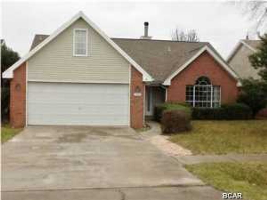 This is not a short sale. Contemporary three bedroom home with vaulted ceilings, tile floors and features both inviting and comfortable. The large kitchen has breakfast bar service as well as a dining area. Spacious living area with a fireplace for chilly evenings. Sliders to patio in the privacy fenced back yard. Master bathroom has double vanity, garden tub and separate shower. All information recorded in the MLS is intended to be accurate but cannot be guaranteed, buyer advised to verify. Sold As-Is.