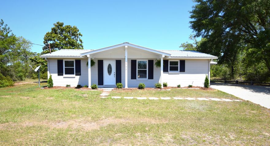 This recently renovated 3-bedroom, 2 bath block home is move in ready!  Upgrades include new vinyl plank flooring, fresh paint, new kitchen cabinets, mosaic backsplash, stainless steel appliances, updated HVAC, new plumbing fixtures, wall to wall carpet and all new energy efficient windows. The split bedroom floor plan offers plenty of privacy for the Master suite which includes his/her closets and en suite bath. Property is located on a dead-end road in the Sunny Hills subdivision where you can enjoy boating, fishing, swimming, golfing and plenty of great roads for the bicycle enthusiast.